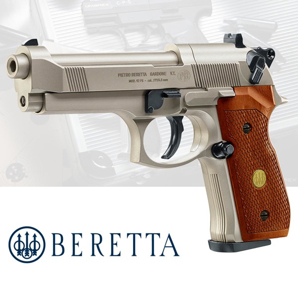 Beretta M92 FS vernickelt mit Holzgriffschalen und einem 8 Schuss Trommelmagazin 4,5 mm Diabolo. Die Kugeln werden mit Hilfe einer 12g CO2-Kapsel beschleunigt